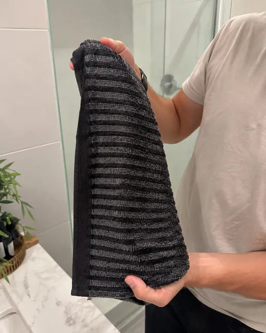 Primo piano della trama intrecciata dell'asciugamano Wove