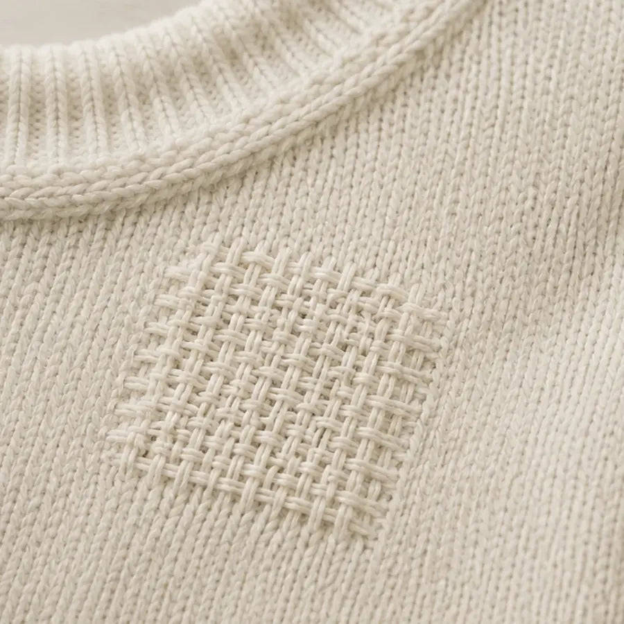 Lo stesso maglione con il buco richiuso con Wove